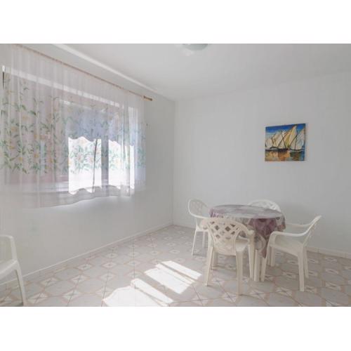 Seafront apartment Olivera with patio