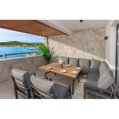 Seafront Villa Kupinica with heated Pool
