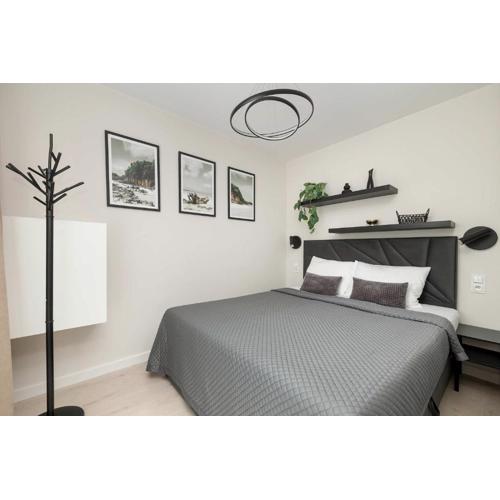 Seaside Apartment with Parking and Air Conditioning Close to the Beach by Noclegi Renters