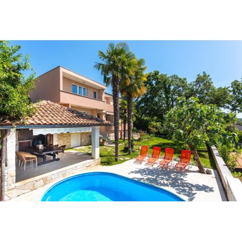Seaside apartments with a swimming pool Njivice, Krk - 21421