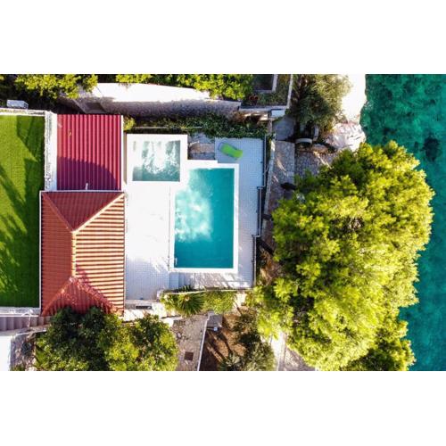 Seaside apartments with a swimming pool Pisak, Omis - 23884