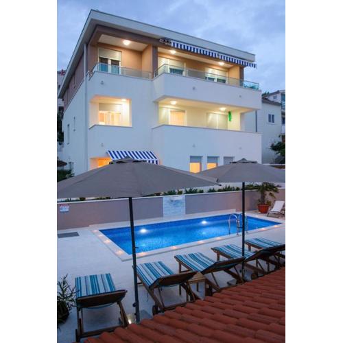 Seaside apartments with a swimming pool Rastici, Ciovo - 11009