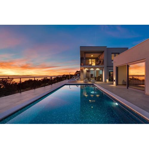 Seaview Villa Big Blue with 32sqm heated pool, 4 bedrooms, and 3 bathrooms