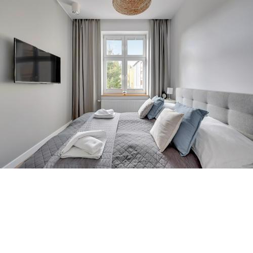 Skandynawski - 4 osobowy apartament przy Monte Cassino by Grand Apartments