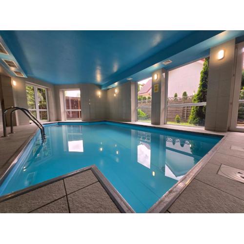 Słoneczny Apartament w Ustroniu Morskim Blisko Plaży by Noclegi Renters