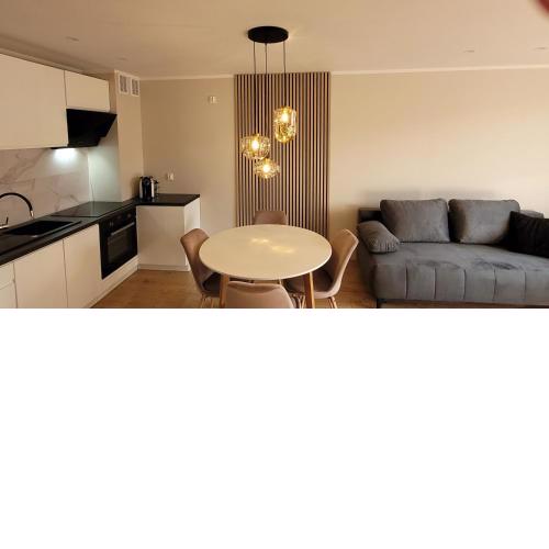 Słoneczny apartament z ogródkiem