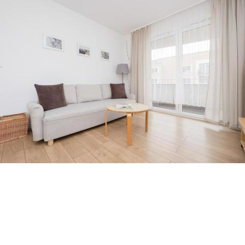 Słoneczny Apartament z Parkingiem by Noclegi Renters