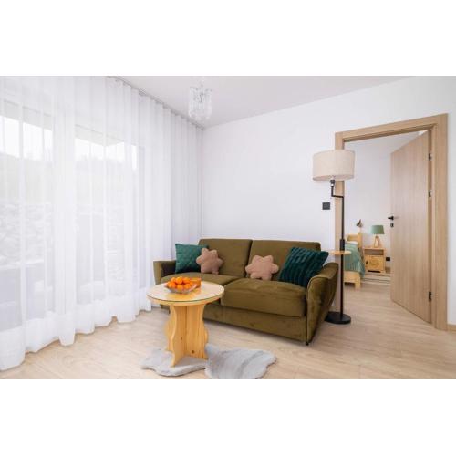 Spokojna Cozy Apartment with Patio & Parking in Wisła by Noclegi Renters