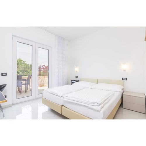 Studio Apartments Funtana with pool