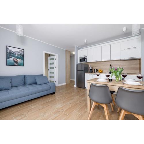 Stylish Apartment Rybacka with Parking by Noclegi Renters