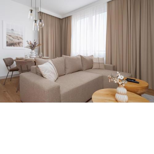 Stylish Beige Apartment with One Bedroom and Parking in Poznań by Noclegi Renters
