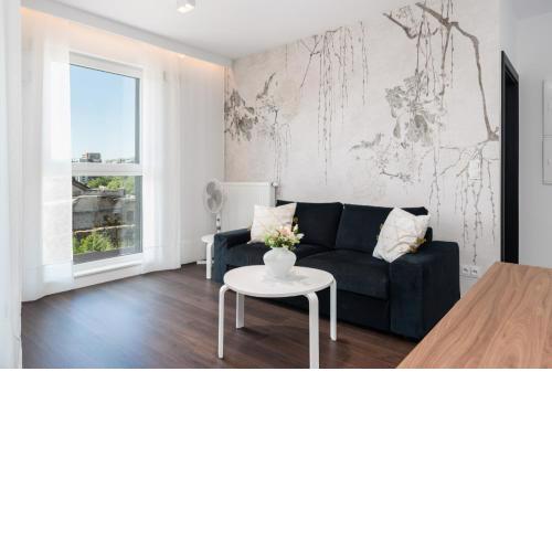 Stylish & Comfy Garbary Apartments with Parking by Noclegi Renters