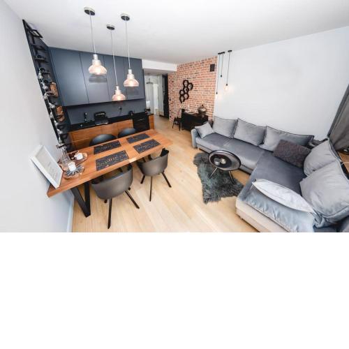 Stylowy Apartament w Centrum Sopotu z Projektorem