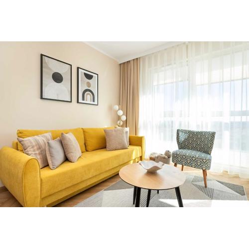 Sunny Apartment with Parking near Polsat Plus Arena by Noclegi Renters