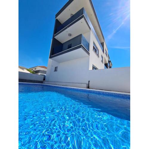 Sunny day , three bedroom apartment with pool