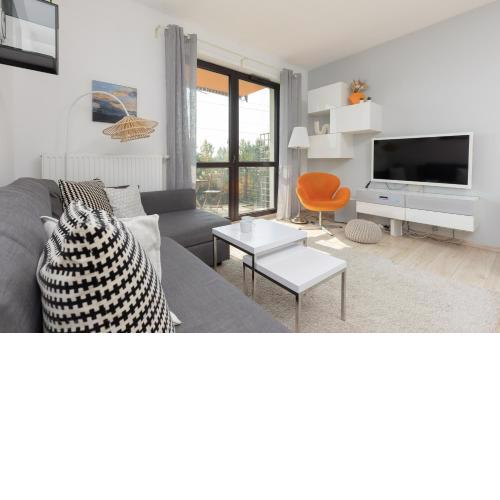 Symboliczna Apartment with Balcony & Parking Warsaw by Noclegi Renters