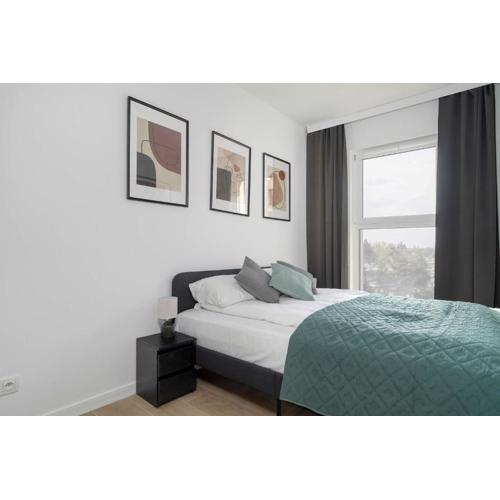 Tasteful Apartment with Parking and Gym by Noclegi Renters