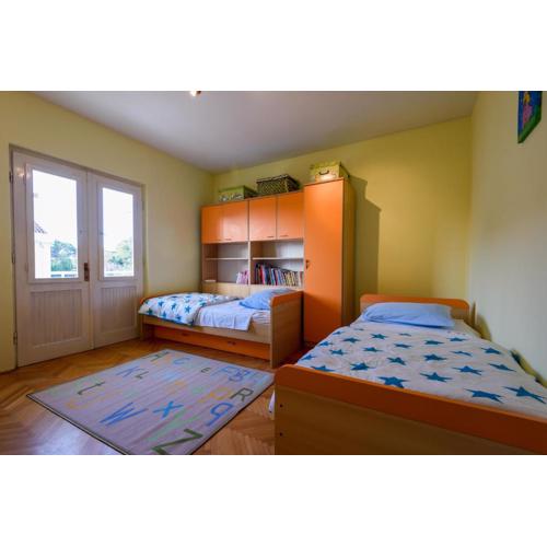 The apartments consists of two bedrooms, a bathroom, a kitchen and a living room
