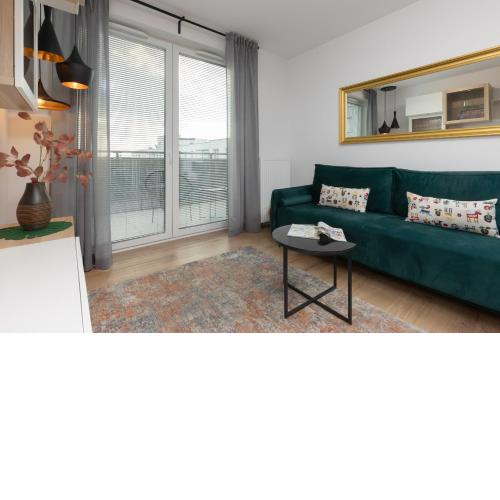 Trendy Warsaw Apartment with 2 Bedrooms, Balcony & Parking by Noclegi Renters