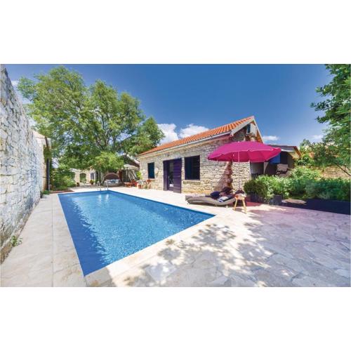 Two-Bedroom Holiday Home In Pridraga