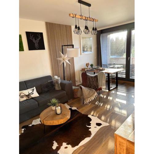 U jelena Harrachov - rodinný apartmán u lesa s garáží