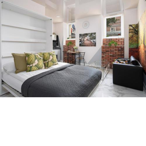 Underground Level Studio Close to the Market Square in Poznań by Noclegi Renters