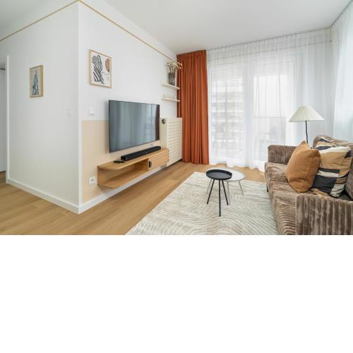 Unique 2-Bedroom Apartment on the 10th Floor with FREE GARAGE Poznań by Noclegi Renters