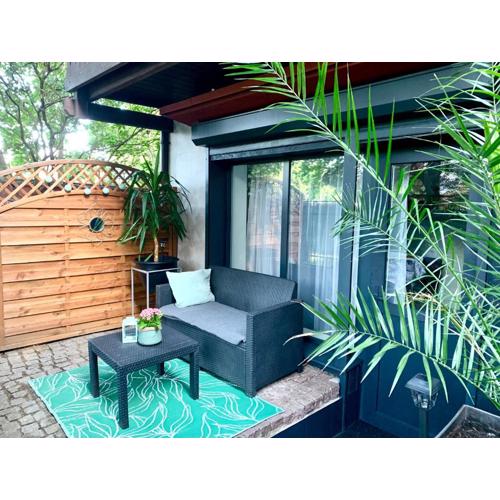 Uroczy Apartament z Patio