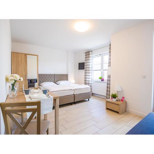 VacationClub - Aquamarina Apartment C-05