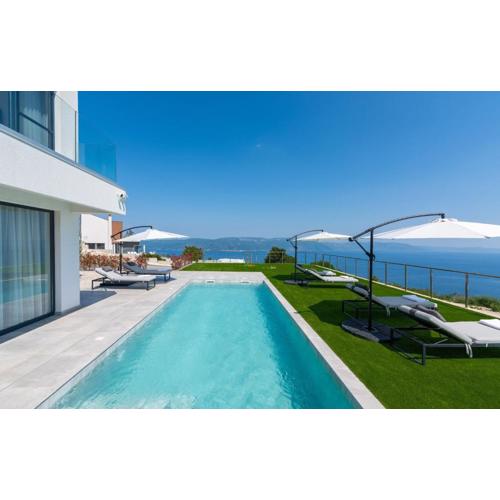 Villa Atrium with heated pool, sea view, jacuzzi, gym and sauna