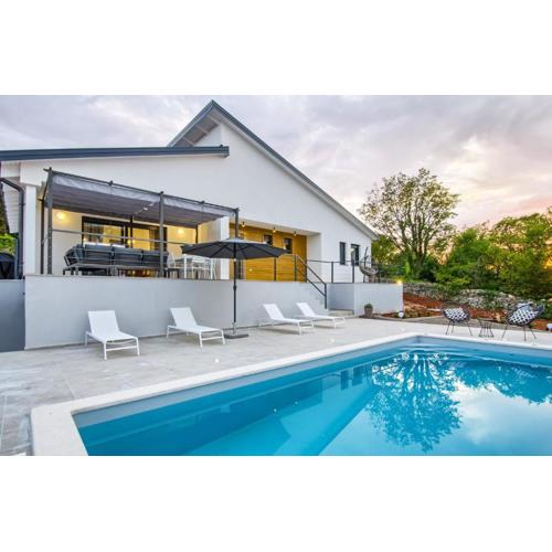 Villa Bellavu for 8 people with playground & sea view in Rakalj