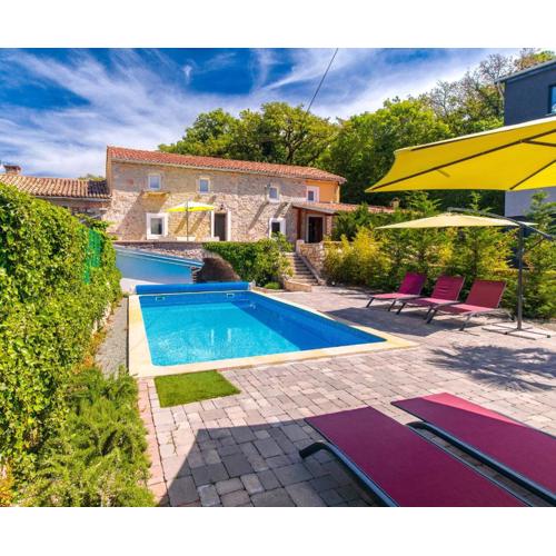 Villa Cati Ferienhaus mit beheiztem Pool