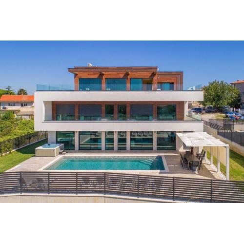 Villa Eligo mit 2 Whirlpools, Meerblick, Pool und Fitnessraum