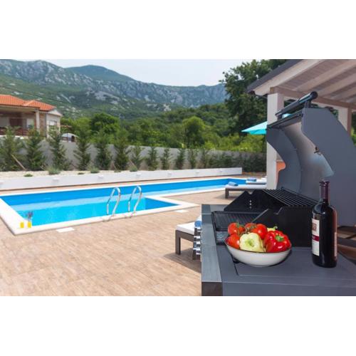 Villa Lavanda with relaxation spot of swimming pool in scented garden, outdoor terrace and barbecue