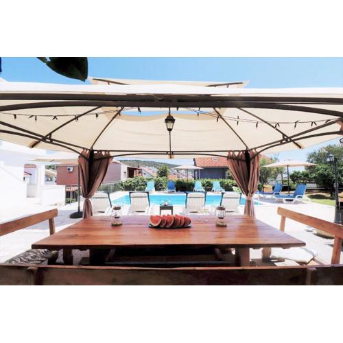 Villa Mendula Trogir - Luxury villa by the beach - heated pool - organic garden