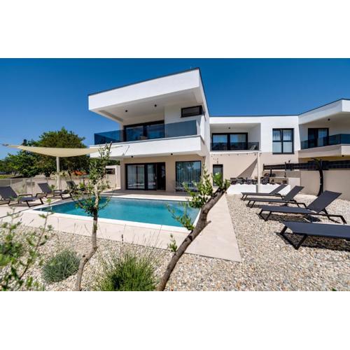 Villa Mirakul, new modern villa with swimming pool, close to the beach, children playroom, quiet area- by TRAVELER tourist agency Krk - ID 2680