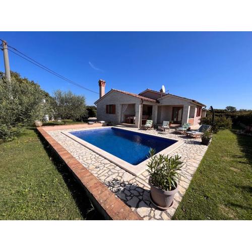 Villa Mirela with a comfortable garden and pool