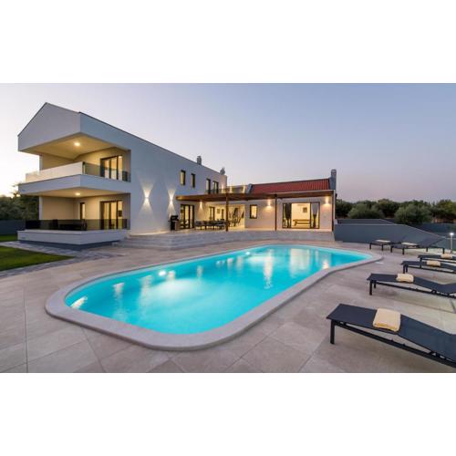 Villa Posidonia near Pula with sea view and surrounded by olive trees