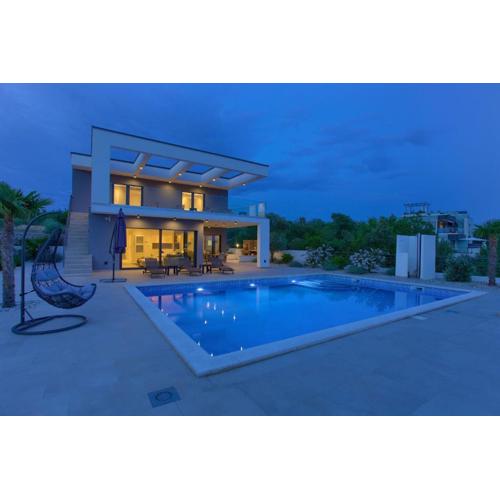Villa QUADRA with heated pool