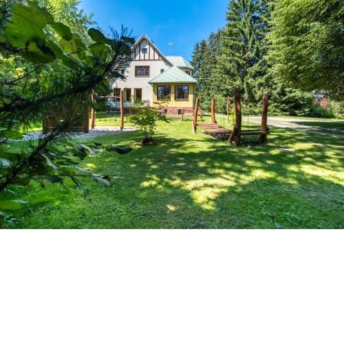 Villa with a covered pool, park, and playground