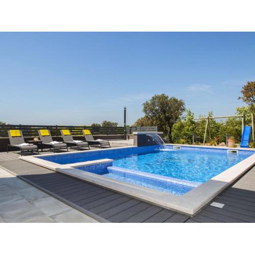 Villa with swimming pool, outdoor kitchen, sauna, jacuzzi, play area and sea view