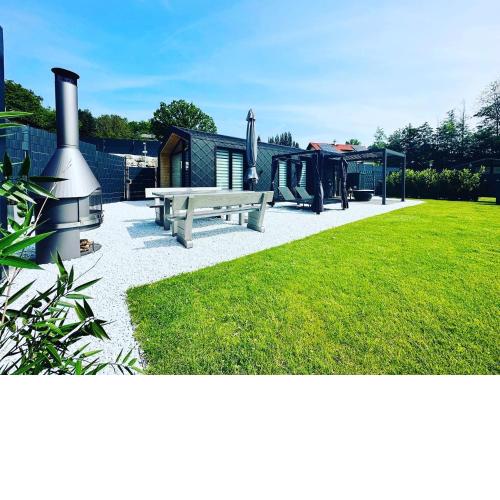 Voralpen Lodge - Ferienhaus mit Gym & Wellnessbereich