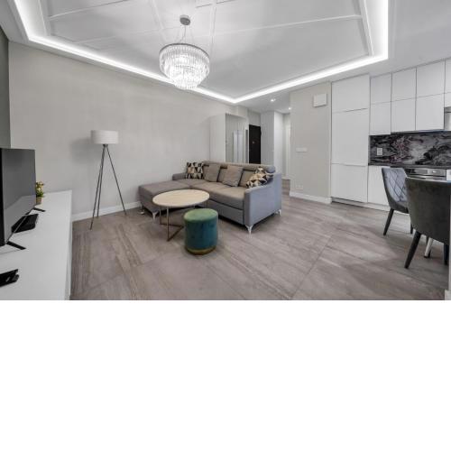 Wola Apartment - 9th Floor, Parking & Balcony - by Rentujemy