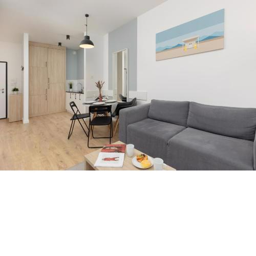 Wola Pet-friendly Apartments with AC Sławińska by Noclegi Renters