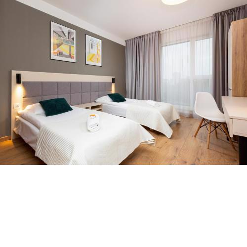 Wolska Residence Apartments with Parking by Noclegi Renters