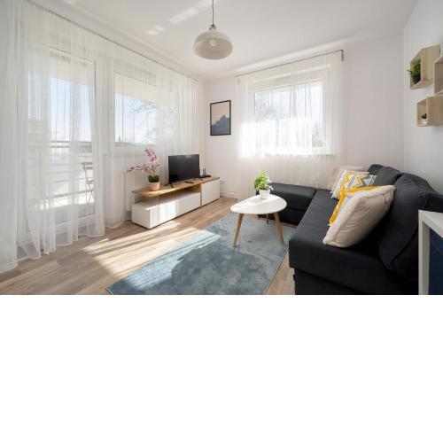 Wyjątkowy Apartament z Parkingiem by Noclegi Renters