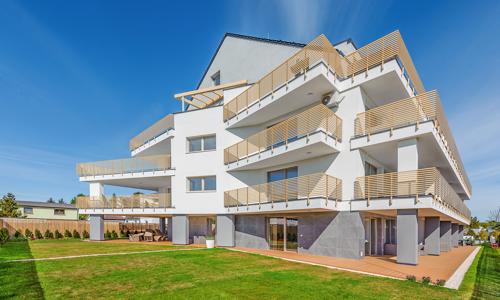 Baltské more len 350 m od pláže: Štýlové apartmány Sun & Snow GEA ECO pre 4 osoby s terasou a fitness centrom