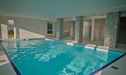 Poľsko pri morskej promenáde a jazere: Mielno Holiday Apartments s polpenziou + wellness, herňa, detský kútik